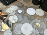 45 MIXED LOT OF NEW AND USED DRUM HEADS WITH ROLLING HARDWARE CASE!!